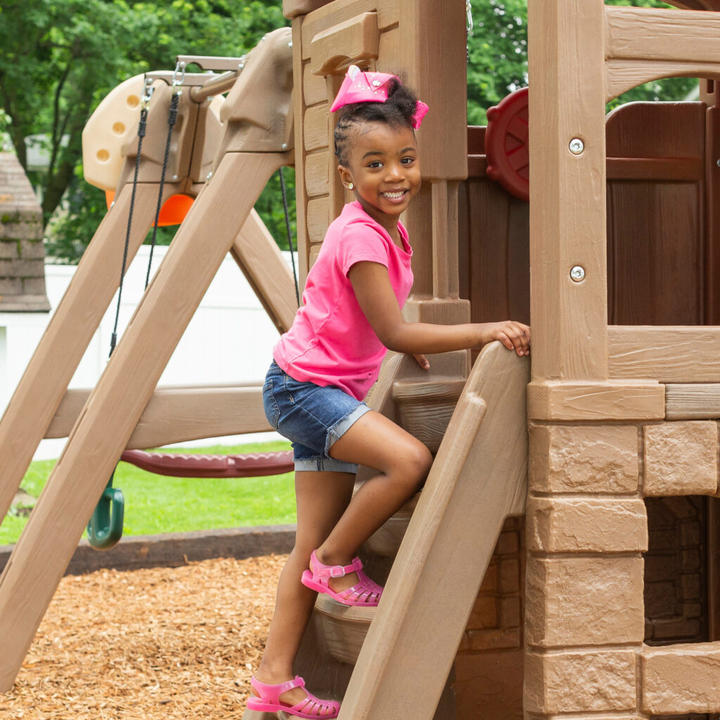 Naturally Playful® Adventure Lodge Play Center with Glider™ Kids Toys