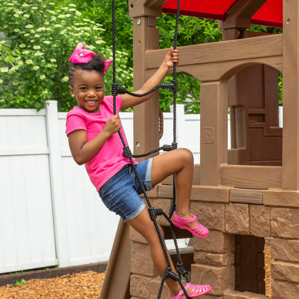 Naturally Playful® Adventure Lodge Play Center with Glider™ Kids Toys